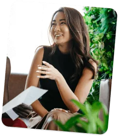 Person sitting and smiling